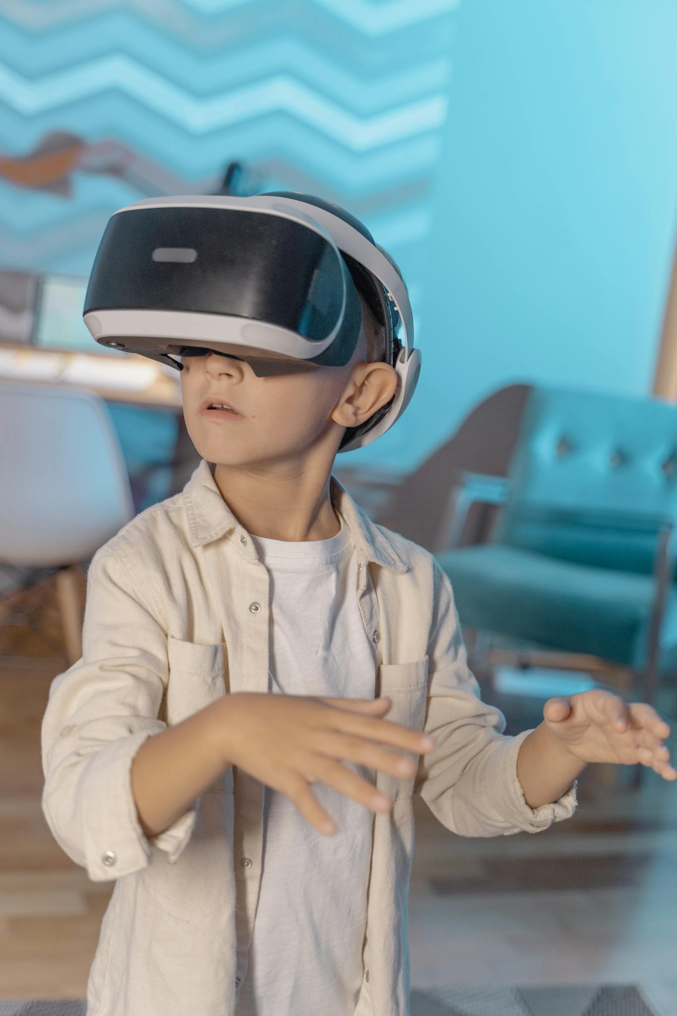 Child experiencing virtual reality indoors with VR headset.